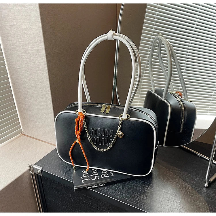 A niche and light luxury single-shoulder Boston bag 2025073003